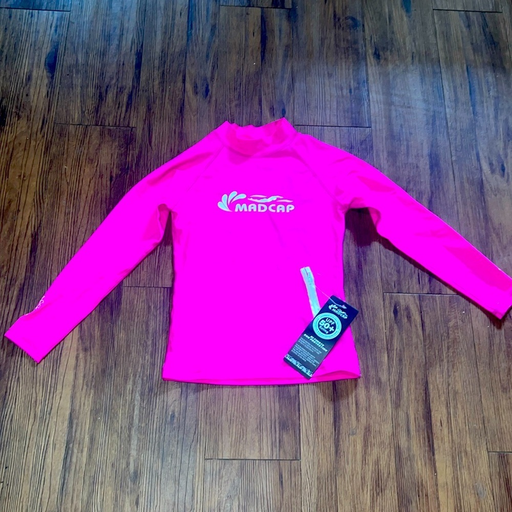 Hot Pink MadCap Ultimate Sun Protector long sleeve Shirt.